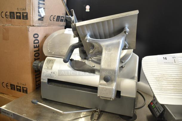 Hobart 2912 commercial semi-automatic meat slicer, 115 volts, 1 phase, in good condition. Features adjustable blade and metallic finish.