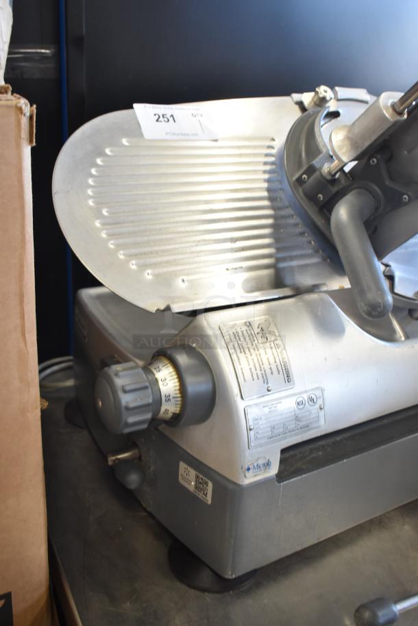 Hobart 2912 commercial semi-automatic meat slicer; 115V, 1 phase; features adjustment knobs and safety labels.