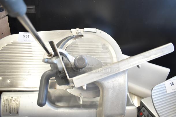 Hobart 2912 semi-automatic meat slicer, 115V, 1 phase, sturdy metal construction, visible adjustment knobs, clean condition.