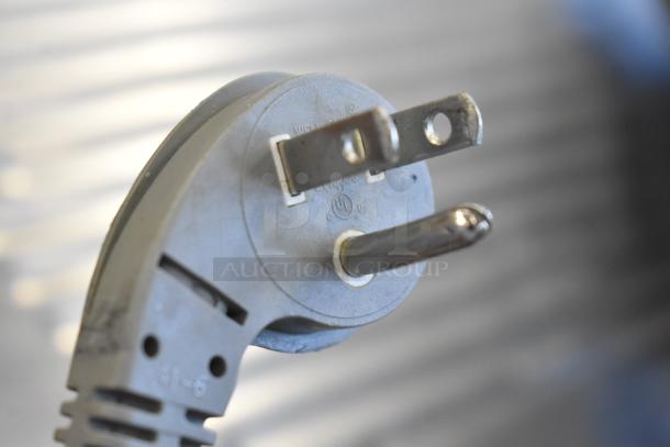 Close-up of power plug labeled ETL on Hobart 2912 Commercial Semi Automatic Meat Slicer, 115 Volts, 1 Phase.