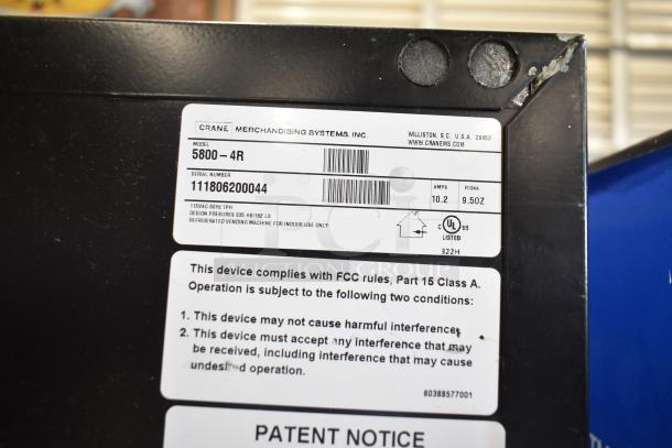 Crane 5800-4 Metal Commercial Vending Machine, bill acceptor, 115V, labels indicate model and compliance details.