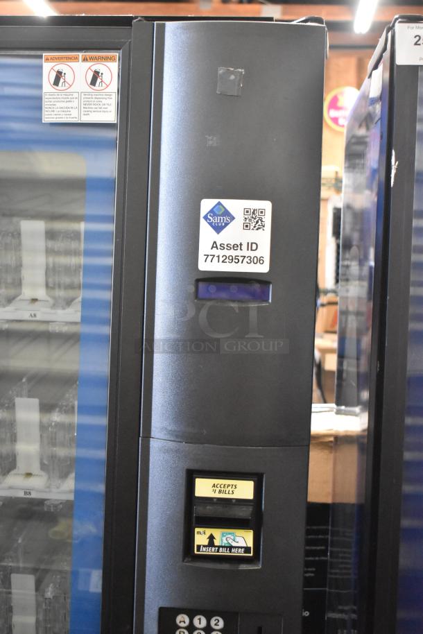 Crane 5800-4 metal vending machine with bill acceptor, 115 volts, single phase, asset ID label visible, used condition.