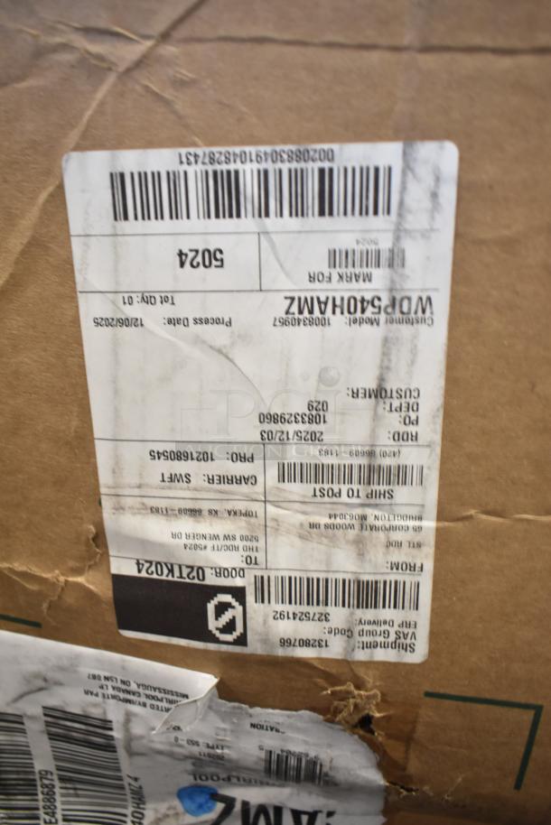 Close-up of a shipping label on a box for a Whirlpool WDP540HAMZ 24 Inch Dishwasher, marked as "scratch and dent."