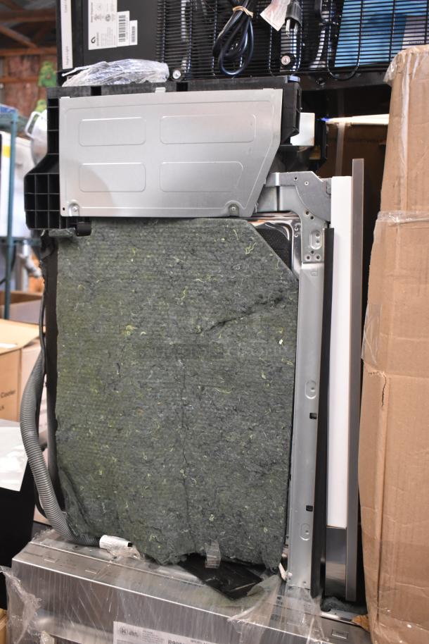 Brand new scratch and dent dishwasher, side view. Features insulation, metal panels, power cord. Great condition.