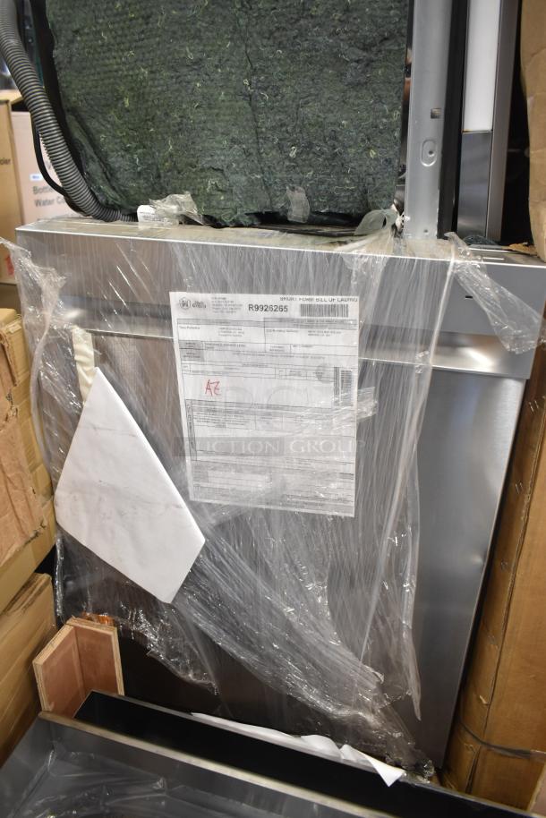 Brand new Honeywell 24" dishwasher, marked scratch and dent. Wrapped in plastic, shipping labels visible on surface.