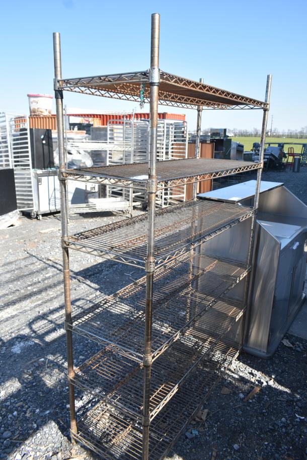 Chrome finish 6-tier wire shelving unit, sturdy metal construction, requires buyer dismantling for shipping.