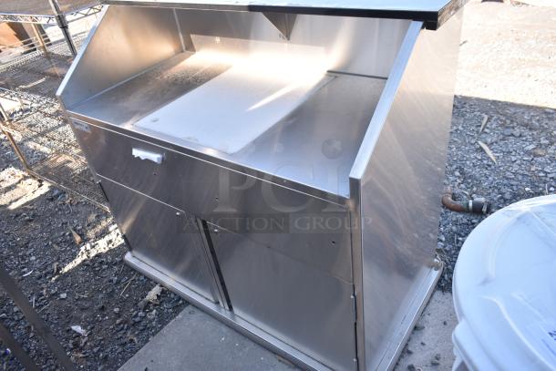 BRAND NEW Regency 600PB48S 48" stainless steel portable bar with two removable speed rails, ice bin, slight scratch.