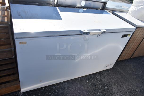 Titan XTCF16 chest freezer, 115V, 1 phase, white exterior, visible scuff marks, Titan logo, used condition.