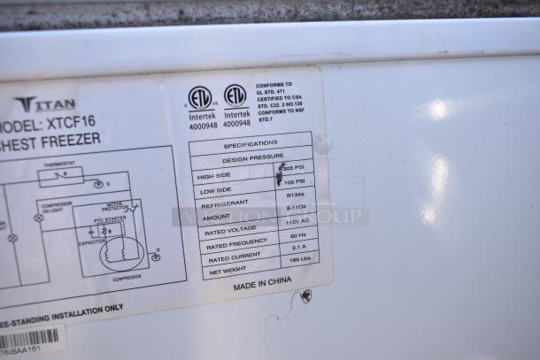 Titan XTCF16 Chest Freezer label showing specifications, including 115V, refrigerant R134a, and design pressure. Made in China.