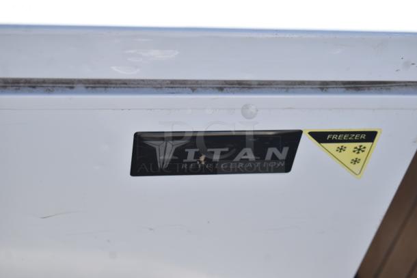 Titan XTCF16 Chest Freezer with 115 Volts, 1 Phase, Titan logo, yellow freezer indicator; appears in good condition.
