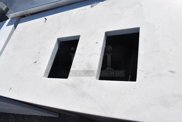 Trash can shell with dual trash deposit holes on surface, some wear visible. Wooden doors not shown. Ideal for commercial use.