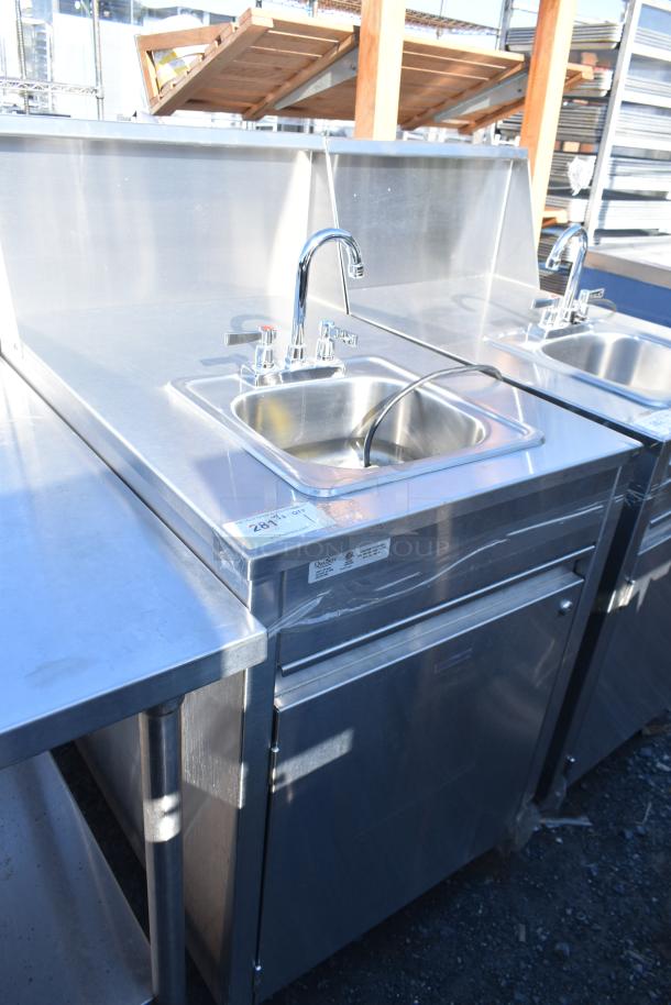 QualServ WMSC24MS commercial portable sink on casters, stainless steel, dual faucet, storage cabinet, good condition.