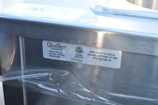QualServ WMSC24MS portable sink with certification labels, model number visible. Stainless steel, on commercial casters.