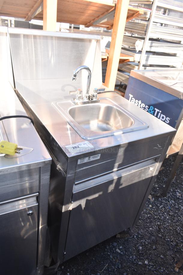 QualServ WMSC24MS portable sink on casters, stainless steel, chrome faucet, label with model and specs, in used condition.
