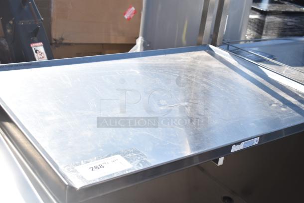 National Cart portable counter with under shelf and drawer, shown with commercial-grade casters; slightly used condition.