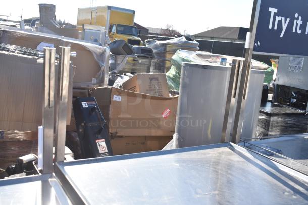 National Cart Commercial Portable Counter, stainless steel, with under shelf, drawer, and commercial casters. Slight wear visible.