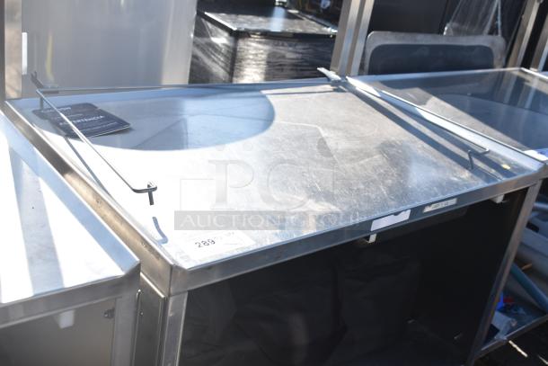 National Cart commercial portable counter with under shelf and drawer, on commercial casters. Model 289 highlighted.