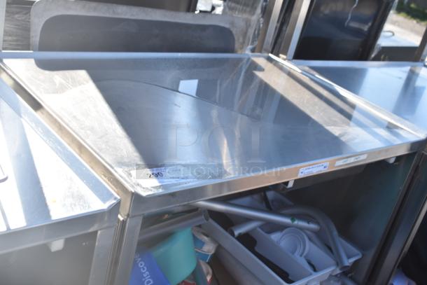 National Cart commercial portable counter with under shelf and drawer, on commercial casters. Visible labels, good condition.