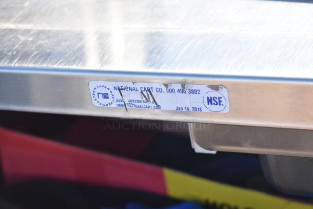 National Cart commercial portable counter with under shelf, drawer, and commercial casters. NSF label dated Jan 16, 2018.
