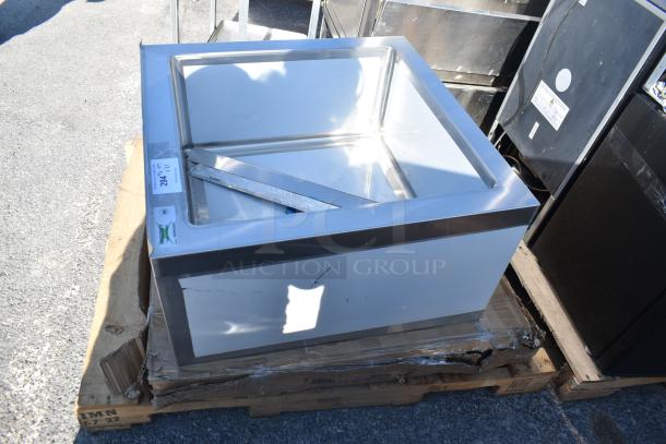 Brand new Regency 600SM242412 29" stainless steel floor mop sink, 24"x24"x12" bowl, on pallet, minor scratches.