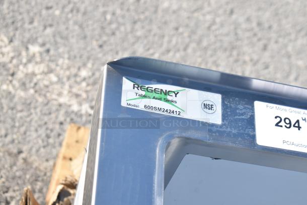 Regency 600SM242412 stainless steel mop sink corner, featuring NSF label and model number, in new condition.