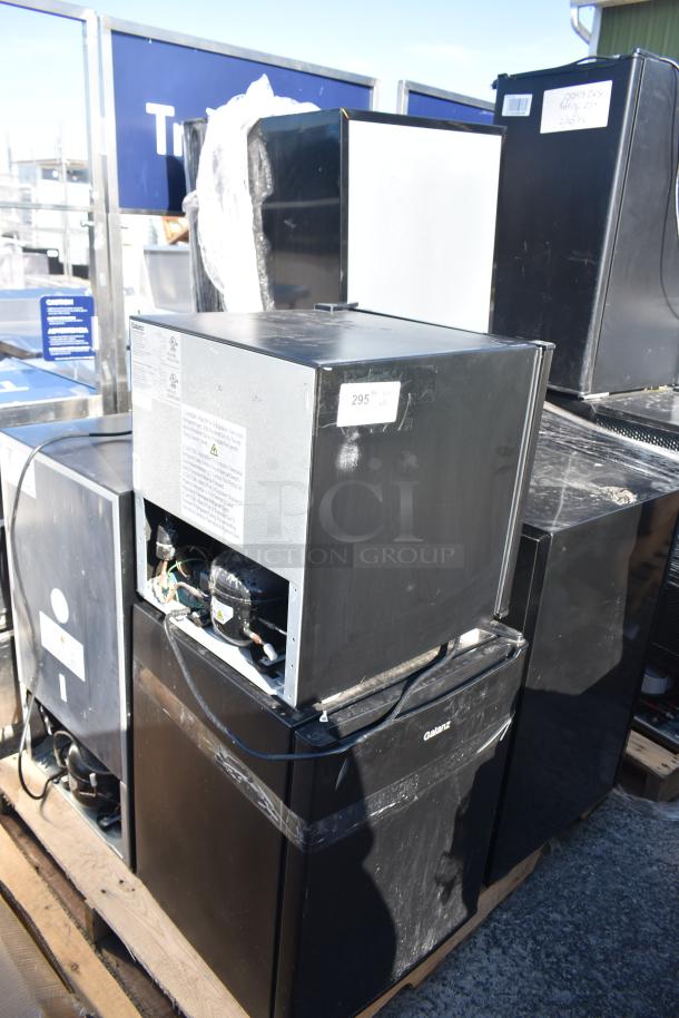 Six mini coolers including Galanz GL17BK and Hamilton Beach REFHB31TS, 120 Volts, 1 Phase, stacked on pallet.