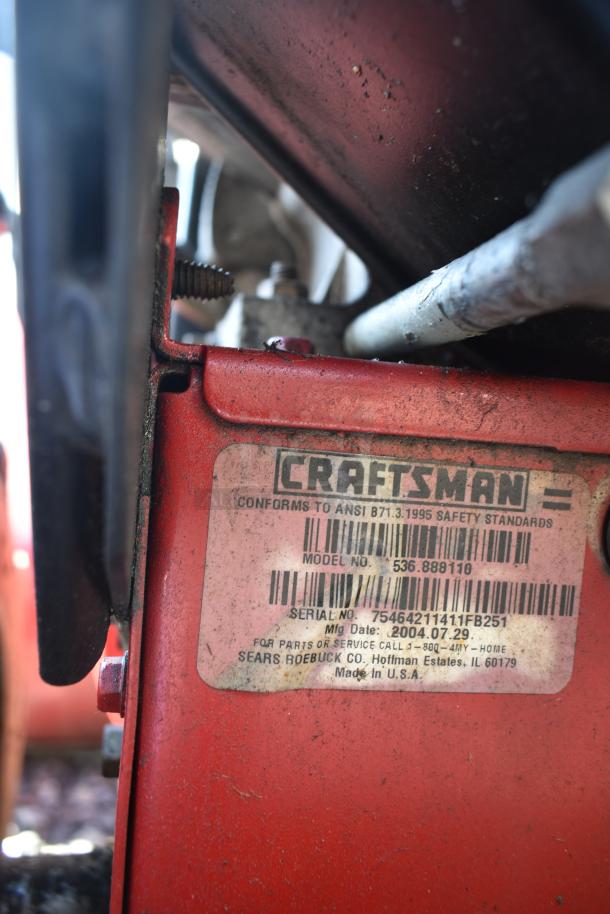 Close-up of a Craftsman 536.888110 30" Snow Thrower label, showing model, serial number, and manufacturer details.
