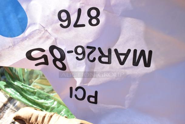 Auction label with code MAR26-85, indicating a lot of 5 brand new scratch and dent items including cushions and a work table.