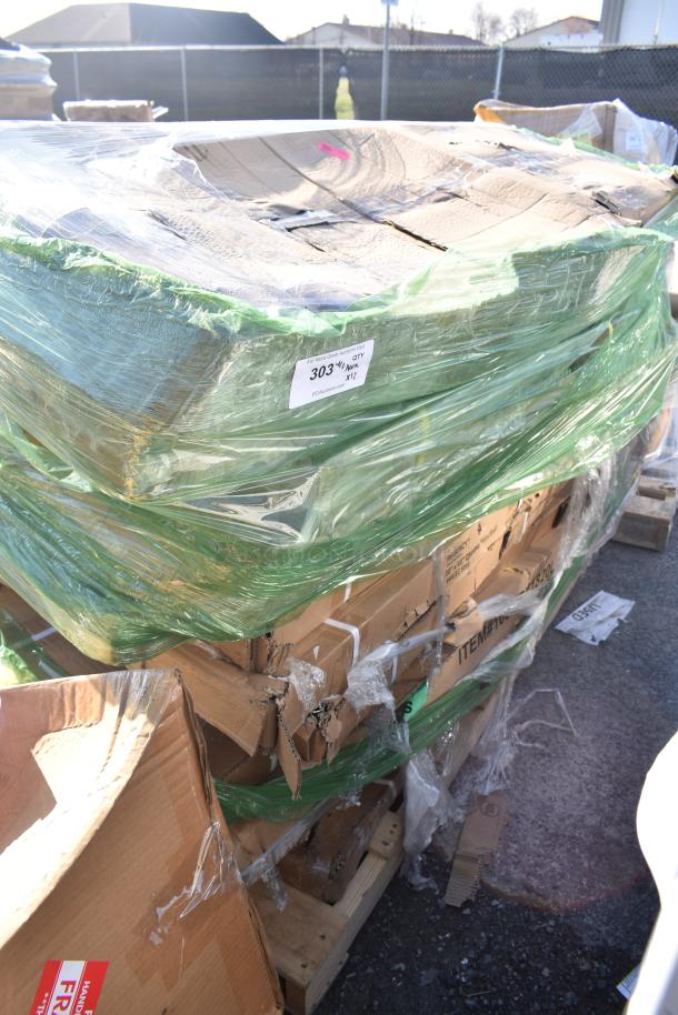 Pallet of 12 brand new scratch and dent items, including shelves and pan racks, wrapped in green plastic with visible outer damage.
