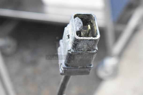 Frontline 401 Commercial Oil Caddy, durable design, on casters, 115V, 1 phase, shown with a power plug detail.