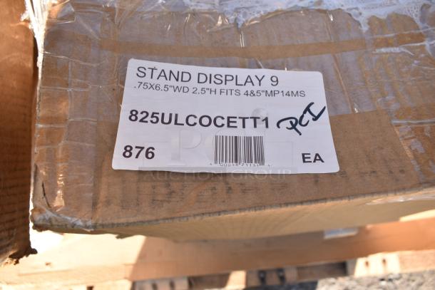Label on cardboard box reading "STAND DISPLAY 9, 0.75X6.5WD 2.5H FITS 4&5MP14MS, 825ULCOCETT1, EA, 876."