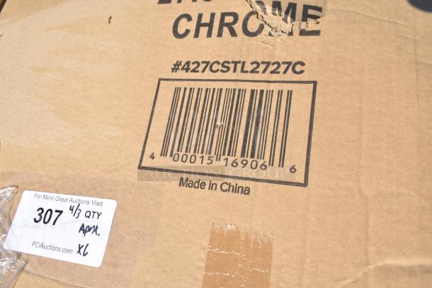 Cardboard box with barcode #427CSTL2727C, marked "Made in China." Contains new scratch and dent table, towel dispenser.