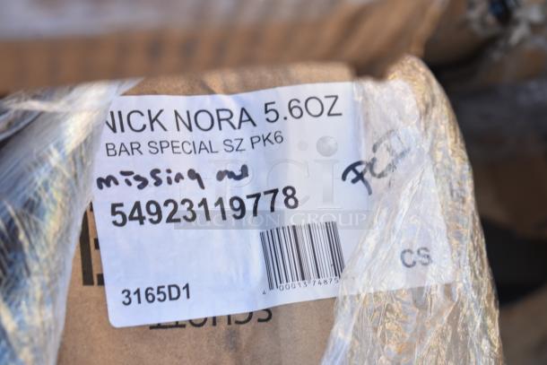 Label showing "Nick Nora 5.6oz Bar Special SZ PK6" with barcode 54923119778, marked "missing" on brown wrapped package.