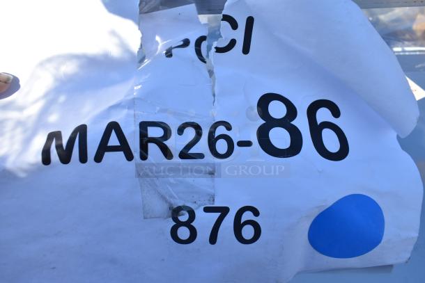 Auction items with 12 new, scratch and dent products including folding chairs. Label reads "MAR26-86 876."