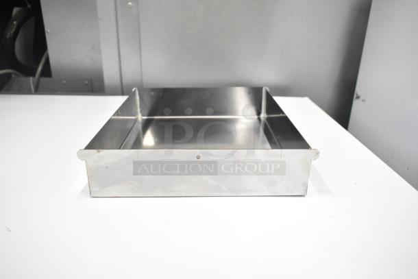 Metallic condenser drain pan, new with minor scratches, part of a six-item scratch and dent auction lot.