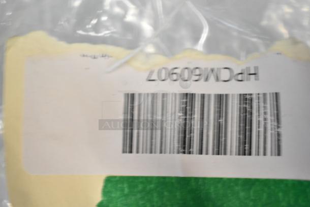 Barcode label on a package of brand new scratch and dent items, including a condenser drain pan and door handle.