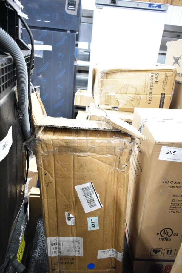 Box with Vulcan Wolf 424171-1 convection oven legs; box is dented with visible labels and barcodes.