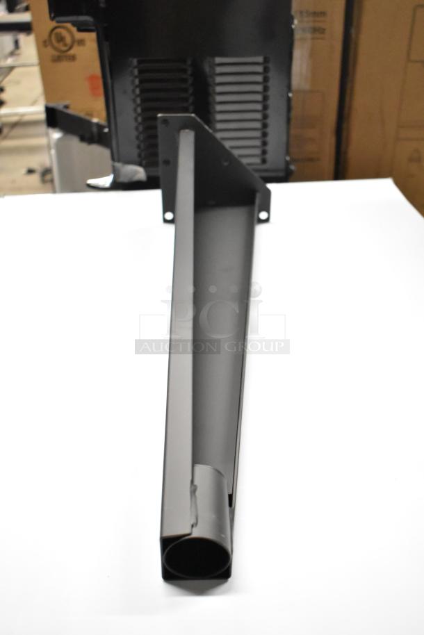 Box of Vulcan Wolf 424171-1 convection oven legs, brand new with visible scratches and dents, in black finish.