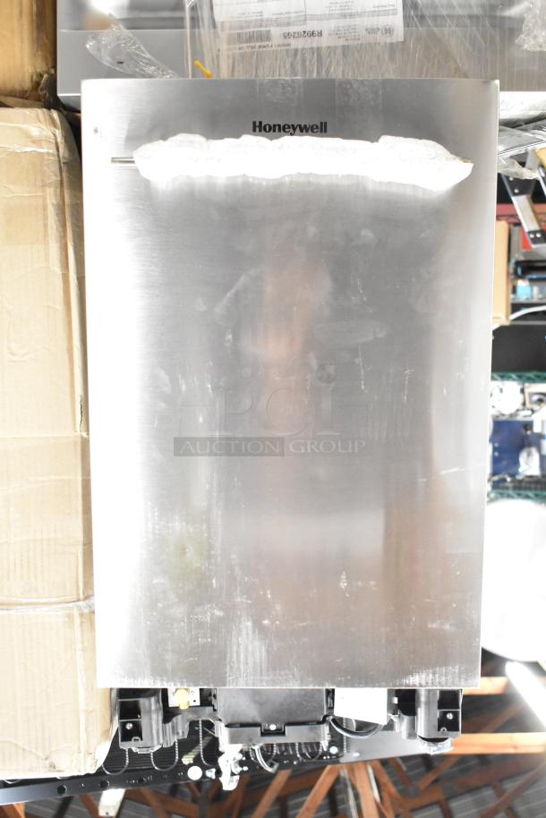 Brand new Honeywell dishwasher, stainless steel, minor scratches, appliance tag visible.