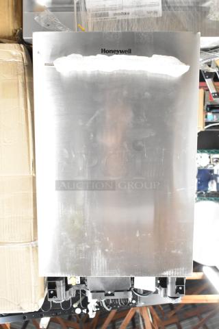 Brand new Honeywell dishwasher, stainless steel, minor scratches, appliance tag visible.