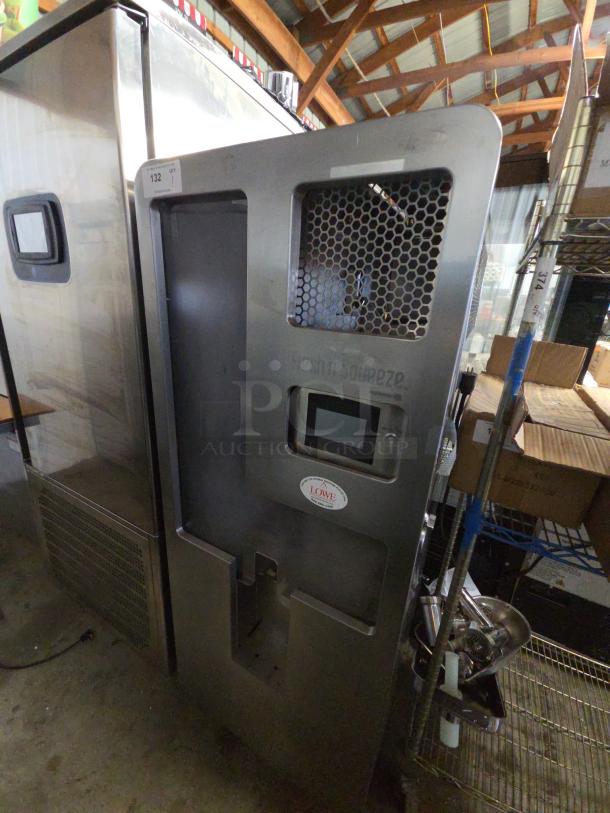 LATE MODEL! JBT 2ND-GEN-MFJ-HE Fresh N Squeeze citrus juicer on casters, 115 Volts, 1 Phase, powers on but parts immobile.