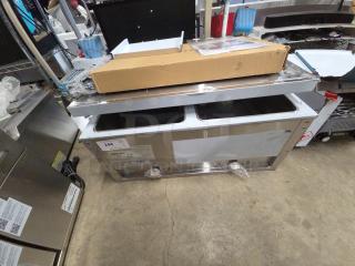 BRAND NEW 2025 ServIt 423EST2WSPB Two Pan Sealed Well Electric Steam Table, partially enclosed base, 120V, tested, visible scratches.