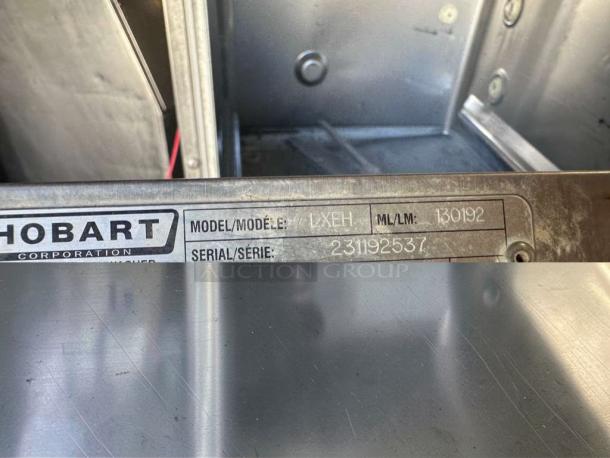 Hobart LXeH-2 dishwasher label showing model and serial number. Stainless steel interior. Fully tested, prime condition.