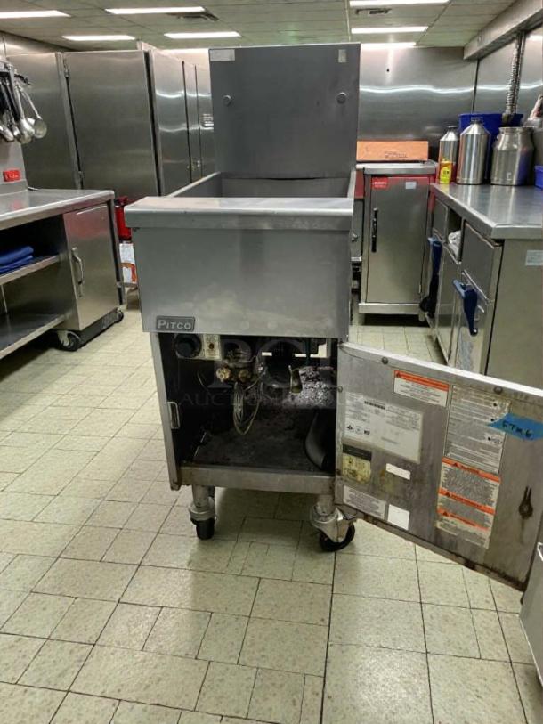 Pitco commercial gas floor fryer, model PIT-L-FRY-0006, in outstanding condition. Natural gas, fully tested and working. Open access panel with labels displaying specifications and safety information.