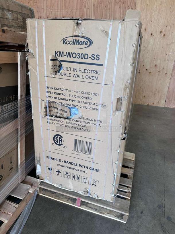 Brand new KoolMore KM-WO30D-SS 30" electric double wall oven in original packaging with visible box damage; never used.