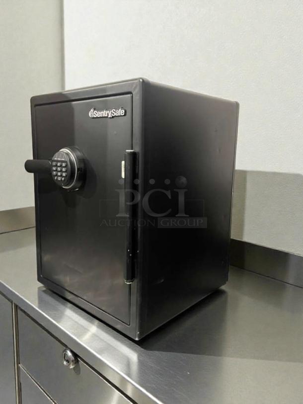 SentrySafe digital safe, polished condition, model SEN-S-SAFE-0071, fully tested, black finish, keypad entry.