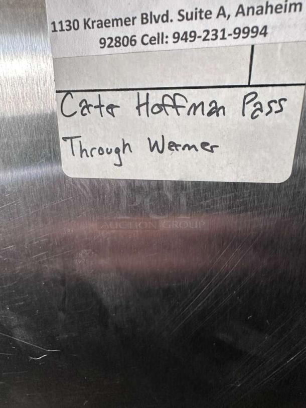 Stainless steel Carter-Hoffmann KFCVOBH208 heated holding cabinet, excellent condition, UL & NSF listed, labeled as "Carter Hoffmann Pass Through Warmer."