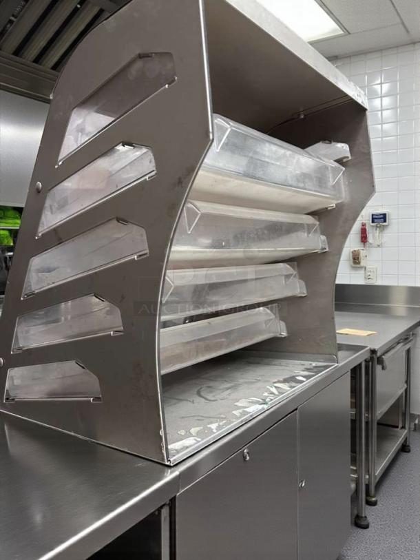 Commercial Bakery Display Case, countertop multi-tier model, in exceptional condition, showing clear shelves for product visibility.
