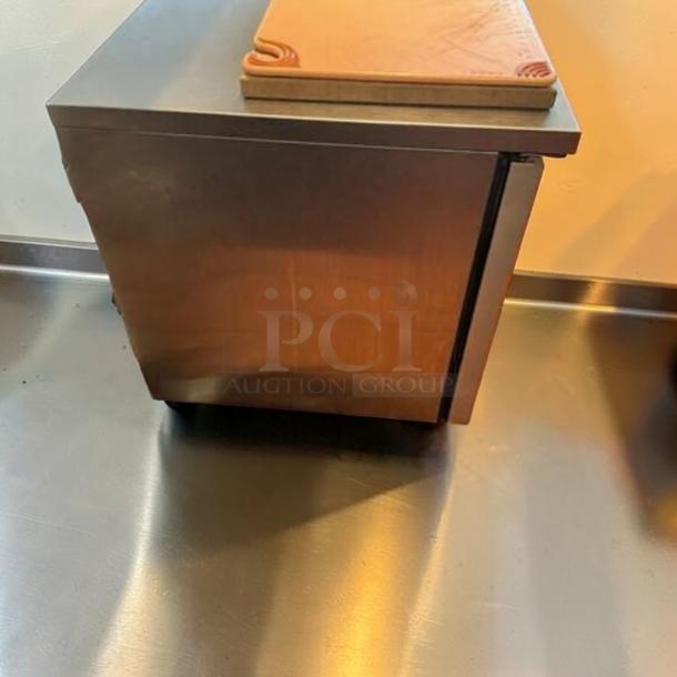 Elite condition True TUC-48-HC undercounter refrigerator, 48" stainless steel, commercial worktop fridge, made in USA.