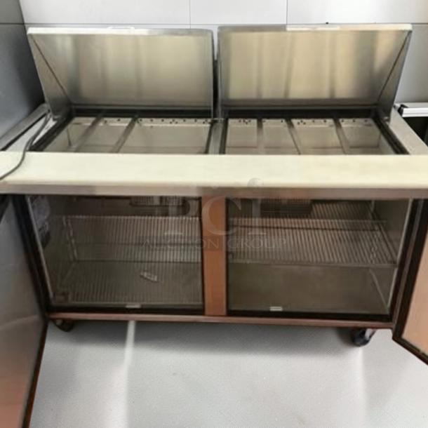 True TSSU-48-12-HC refrigerated sandwich prep table, stainless steel, 48", pristine condition, fully tested, USA-made.